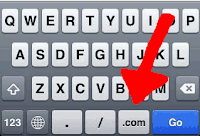 iPhone keyboard with .COM button.