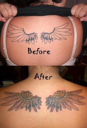 wings on back tattoo. angel wing tattoos on ack.