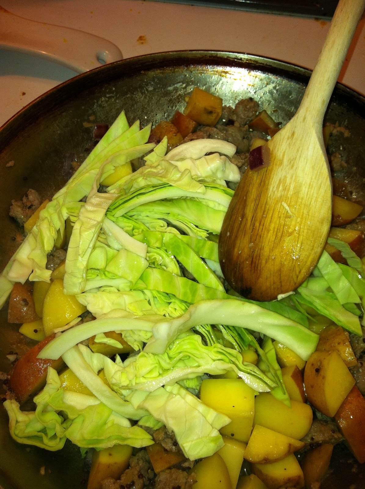 The Curried Cook Bangers N Mash with Cabbage (Island Style)