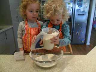 Sifting flour into a bowl for rainbow cake. Sifting flour into a bowl for rainbow cake.