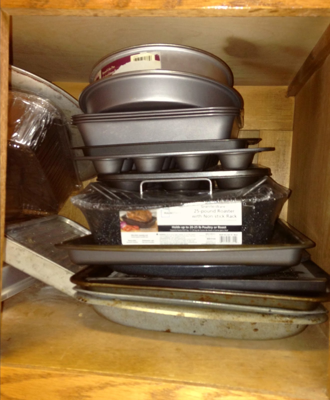 Here's to Life. Tension Rod Bakeware Storage