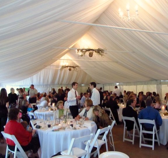 The reception was in an outdoor tent at Oak Ridge Golf Course a short drive The reception was in an outdoor tent at Oak Ridge Golf Course a short drive