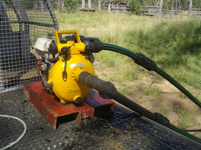 eight acres: setting up a dam pump