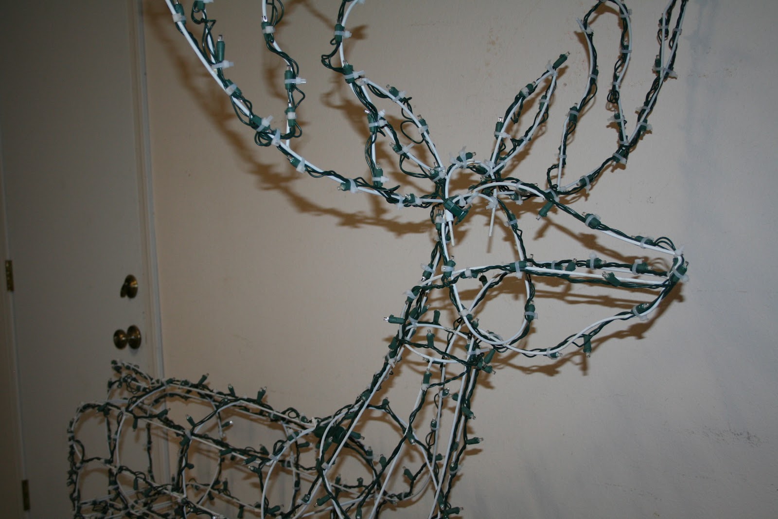 Scoontemplations Restringing an outdoor lighted deer