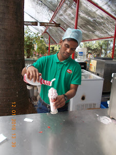 Preparing the famous "Strawbgerry Cream" at "MAPRO GARDEN".