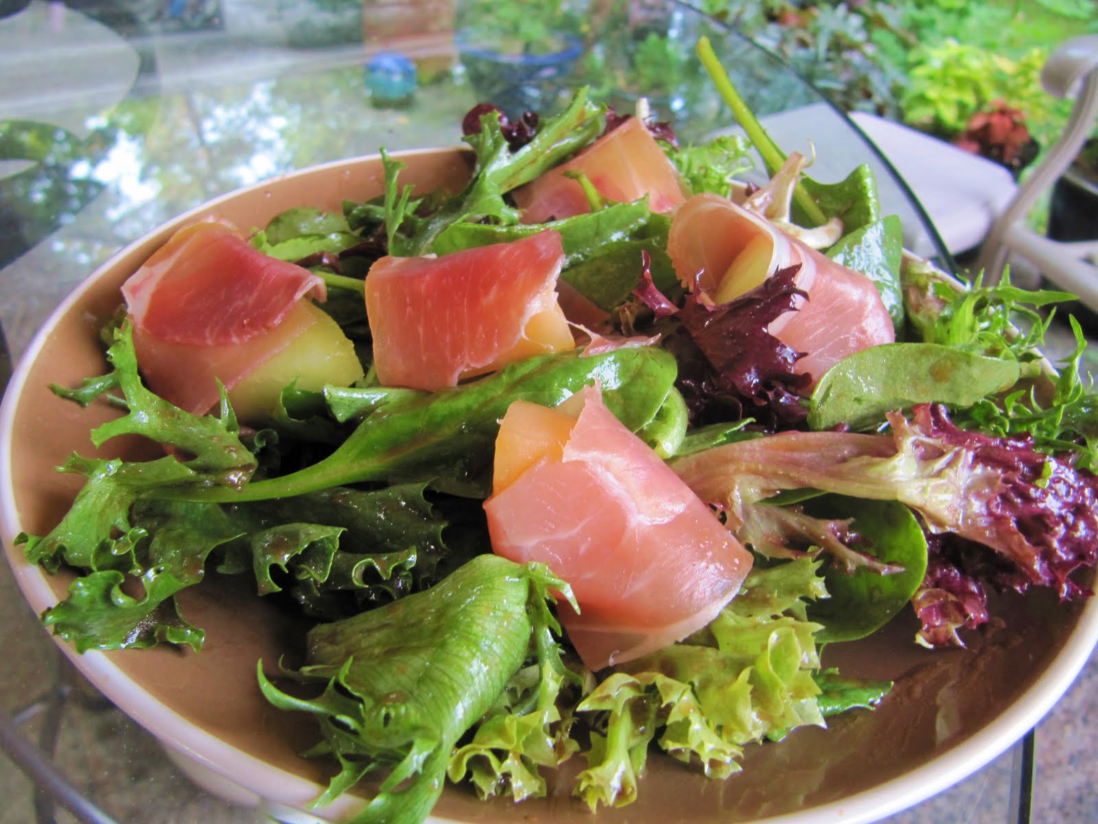 Mama Ozzy's Table ProsciuttoWrapped Melon with Baby Greens and Honey Balsamic Vinaigrette