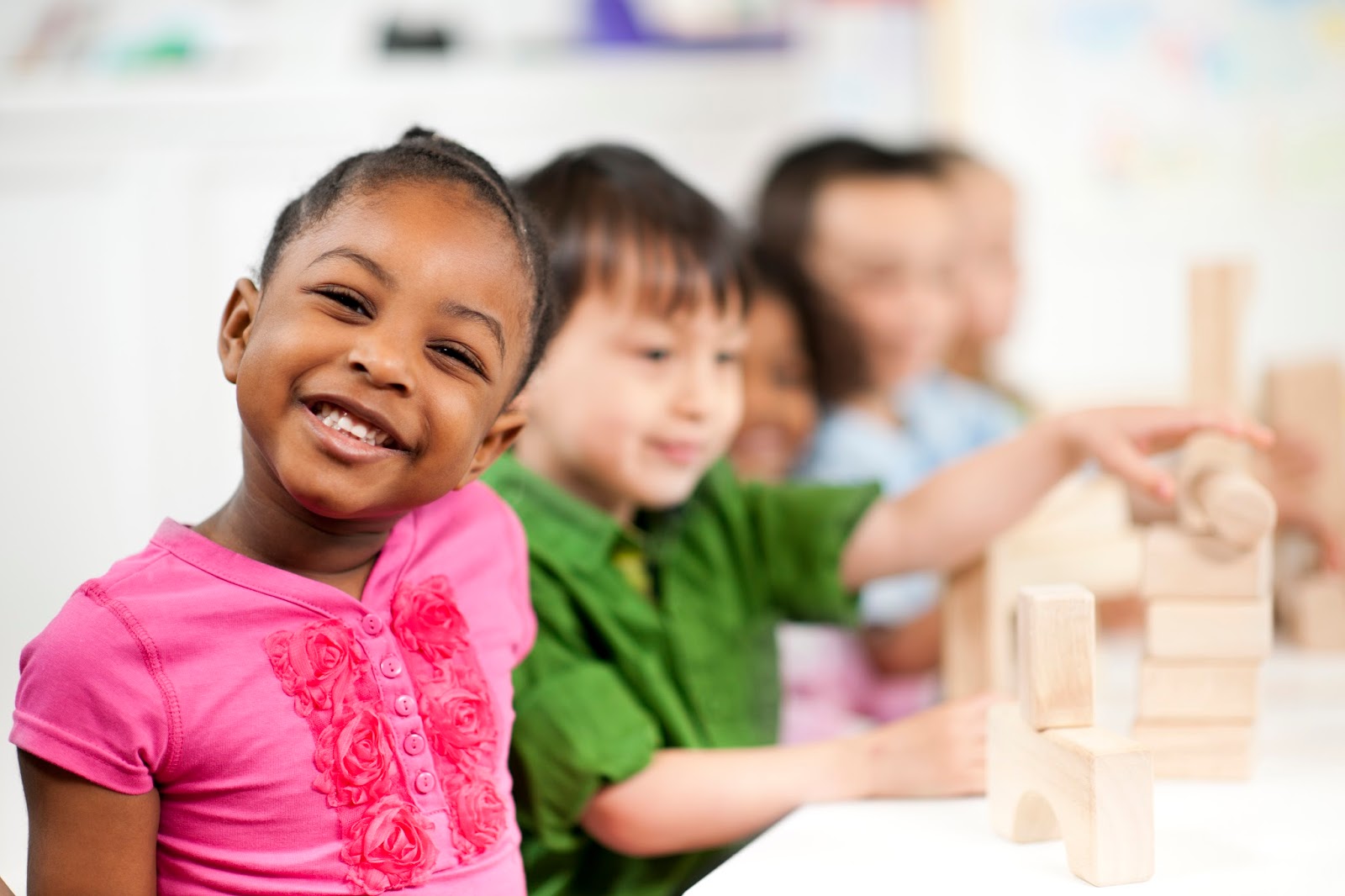 NAMC Montessori Twenty Years girl smiling in class