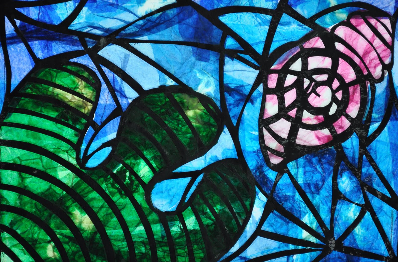 I teach art Stained Glass Window Designs in Paper