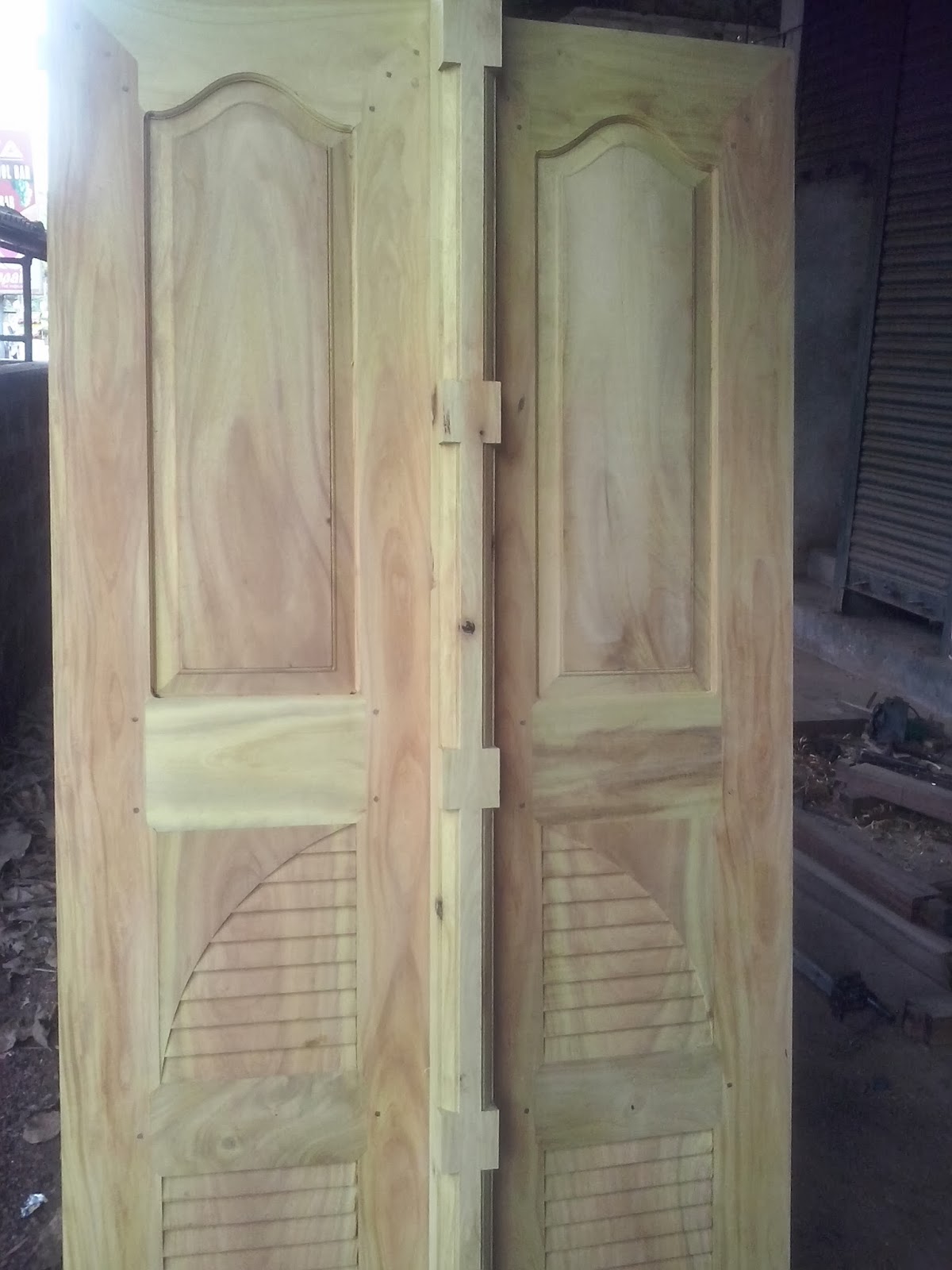 Bavas Wood Works Main Entrance Wooden Double Door Designs