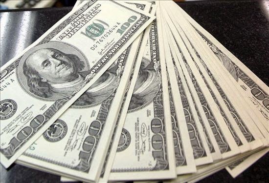 DOLARES...