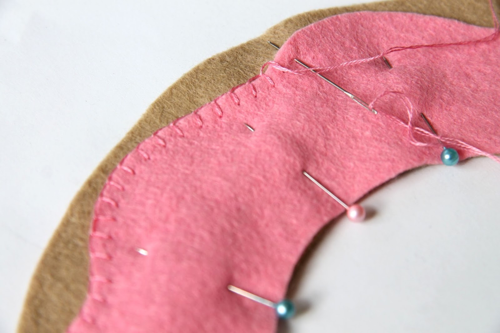 Use blanket stitch to attach the felt