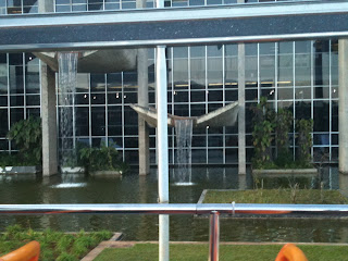 a water fountain in front of a building