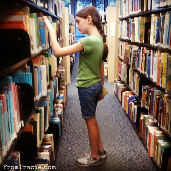 looking at books in the library