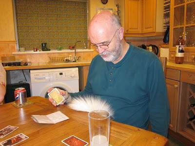 Saboteur - Crispin is distracted by what looks like a large hairy caterpillar crawling along the edge of the table