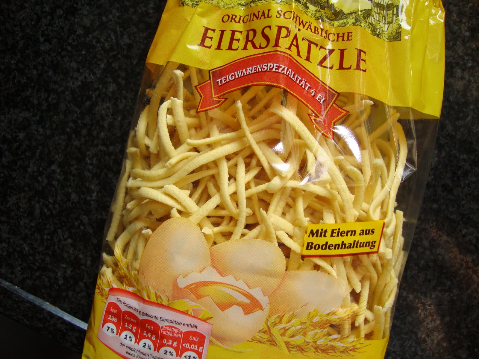 Bookshelves and Stove tops German noodles (Spätzle) with spinach