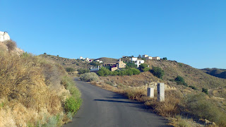 The house in the centre of the picture gives our area's name, it is called Cortijo Curato.