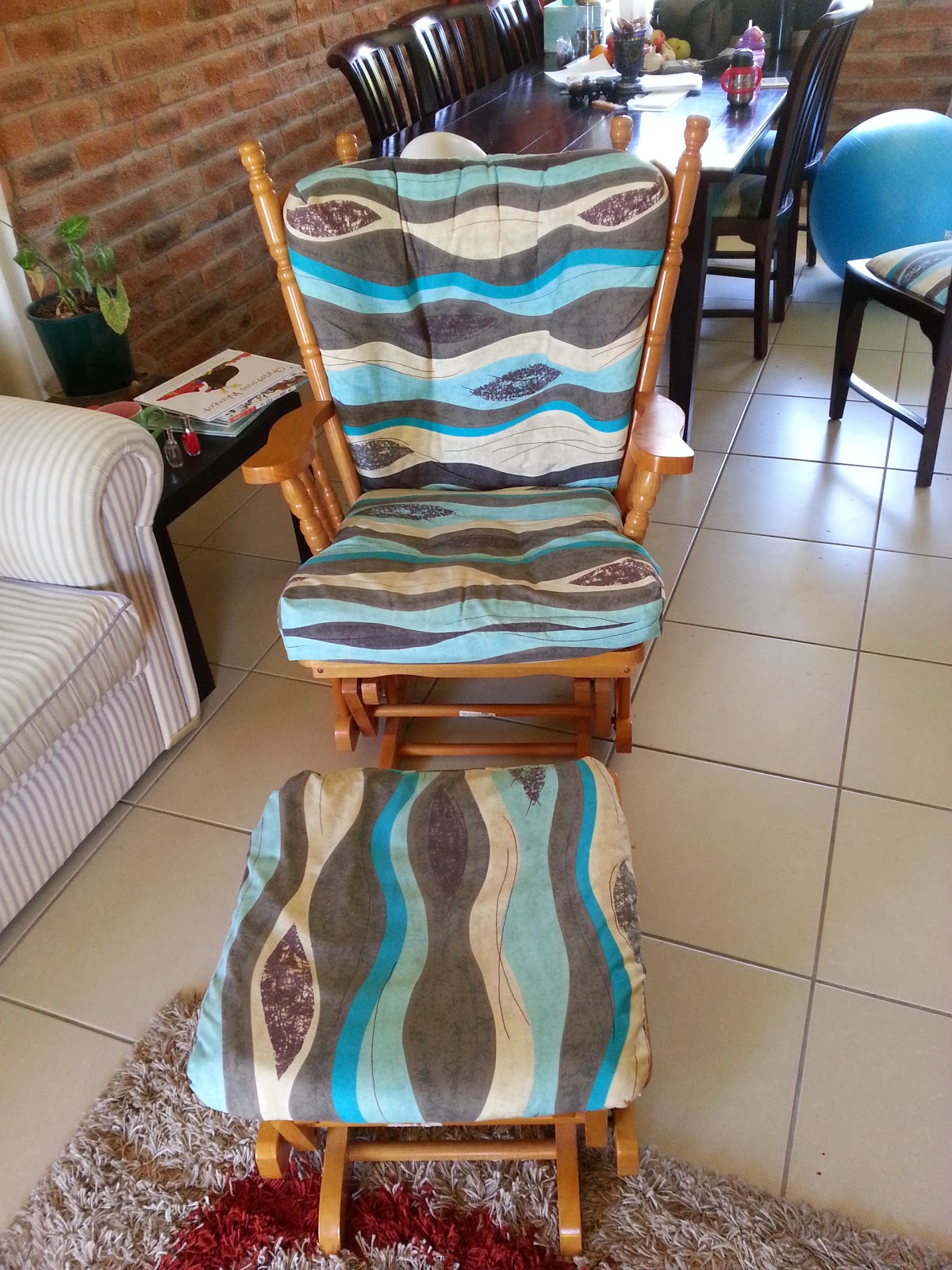 Nicorett: Reupholstered Glider Chair