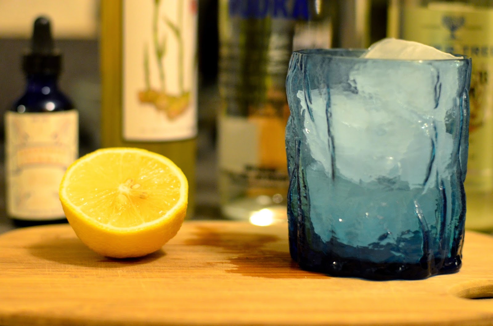 a grounded table Ginger Beer Vodka with Bitters
