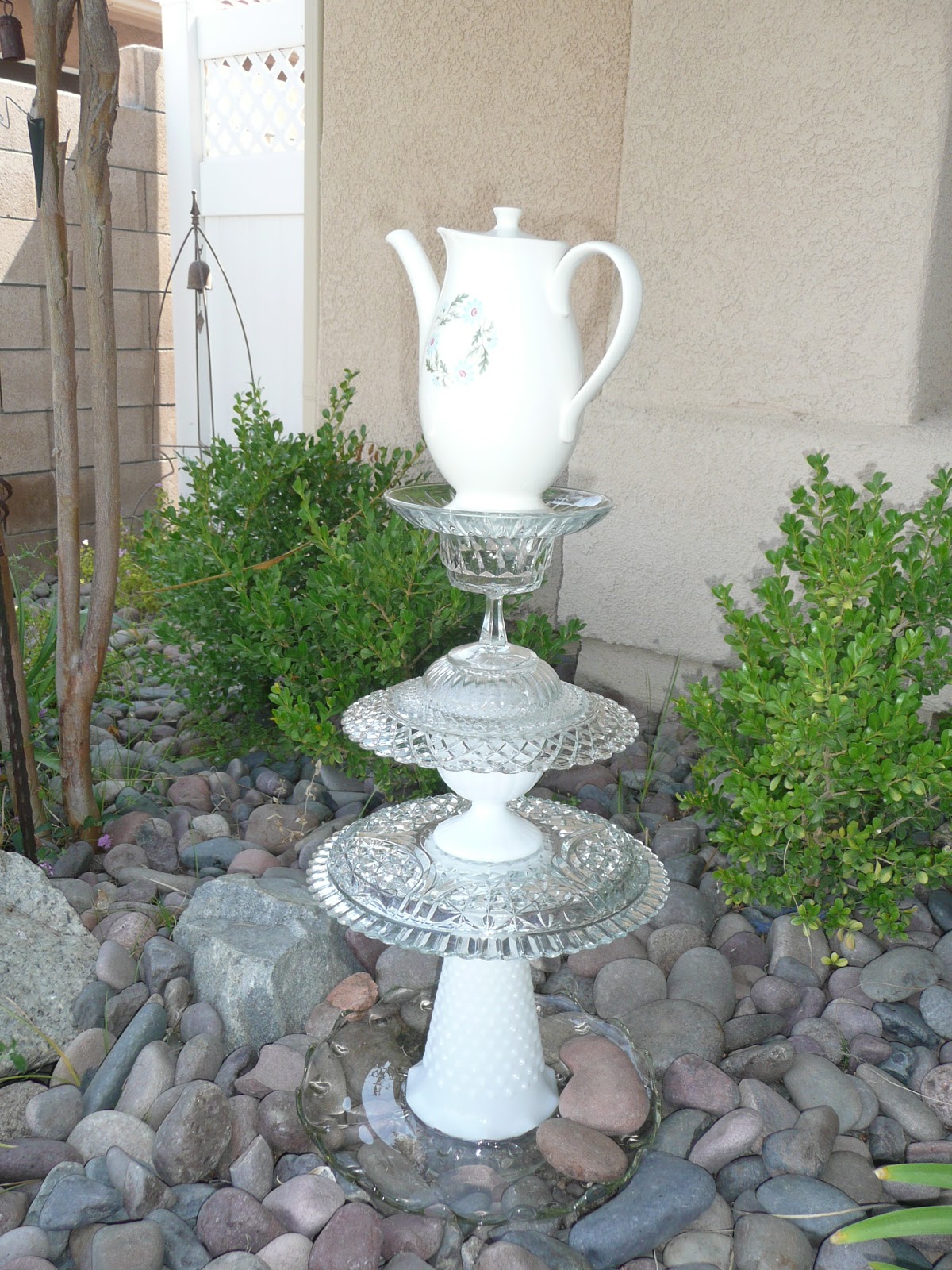 Me, Myself and Tena My teapot totem pole