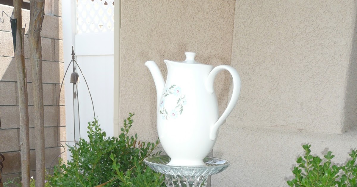 Me, Myself and Tena My teapot totem pole