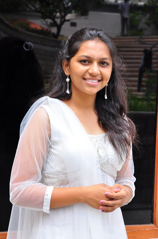 Sri  New Telugu Heroine PicsPhotos white dress hot images