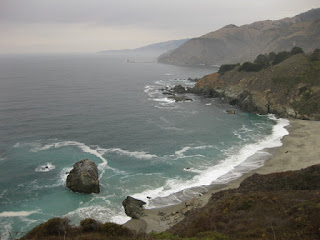 Teal water in a cove along the California coast, south of Big Sur