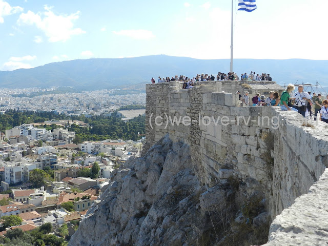 The rock and blocks support the walls of the Acropolis