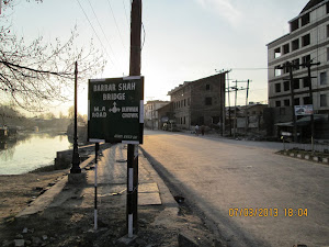 "DIAMOND GUEST " is situated on the opposite of the "BARBAR SHAH BRIDGE" sign board.