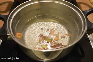 whole spices in the water boiling for biryani