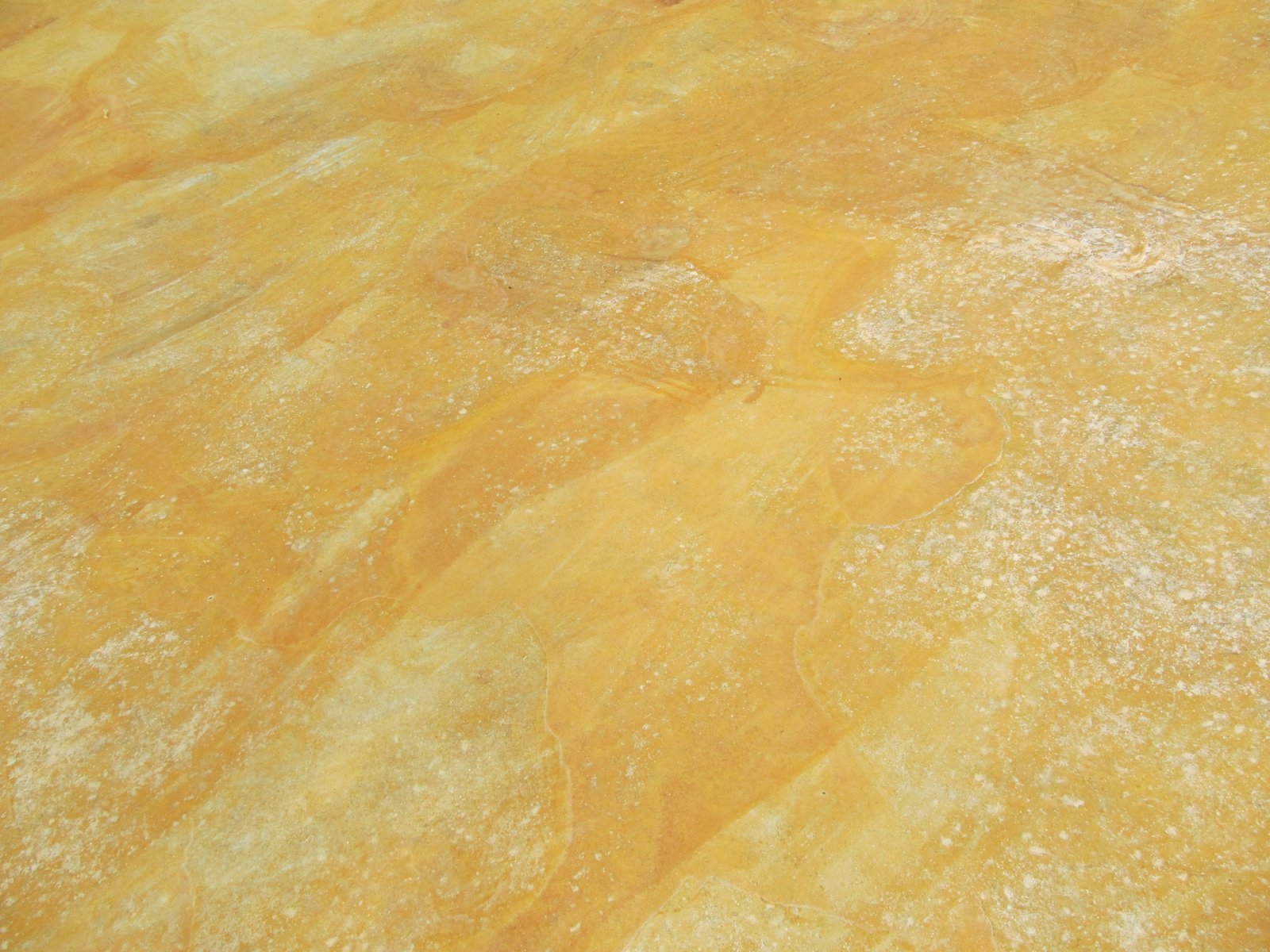 Thistle Creek House Staining the Slab Floor with Iron Sulfate