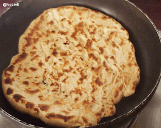 Garlic naan in the frying pan