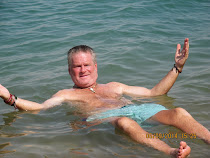 High salinity allows you to effortlessly float ... Dead Sea, Israel/Jordan border.