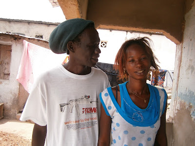 Mame Diarra with her husband at their home in The Gambia.