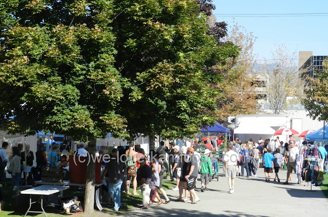 Many people at the Farmers Market gather for the tomato festival