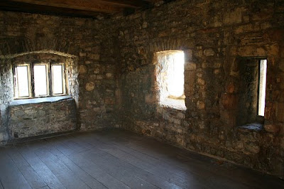 Room in the top of the tower, wonder who slept here? Tower top room