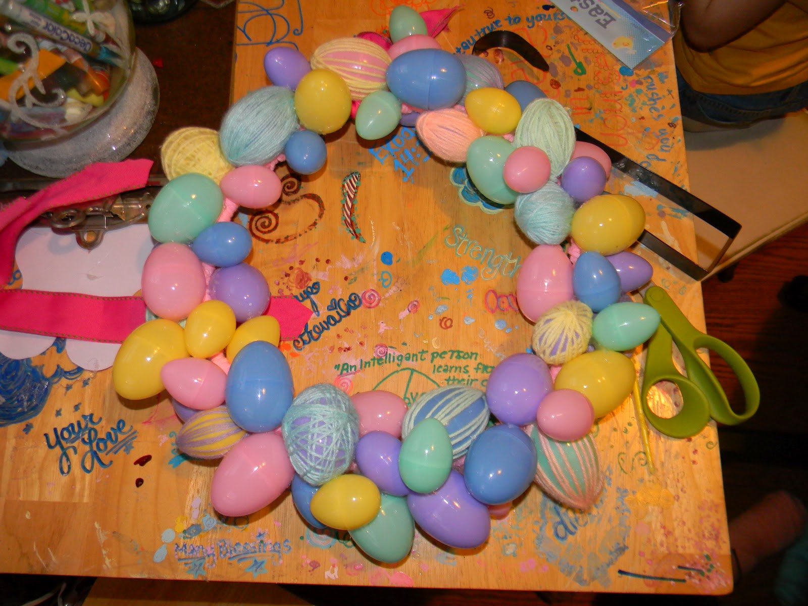 Custom Design's by Nicole Plastic and Yarn Easter Egg Wreath