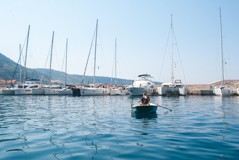 oldest fisherman in the port of vis Vis Island port image with old fisherman in it - croatia