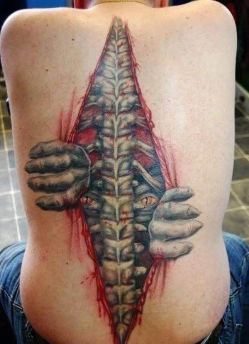 3D rib cage tattoo on full back with hand