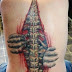 3D rib cage tattoo on full back with hand