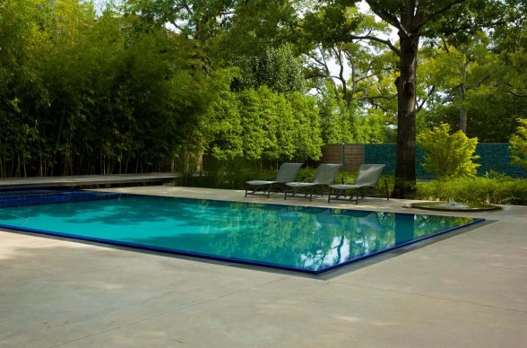 modern swimming pool outside house