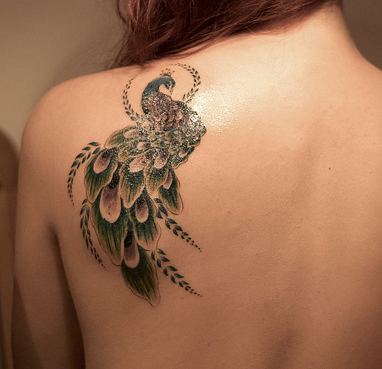 feather tattoos on back body girls 10 