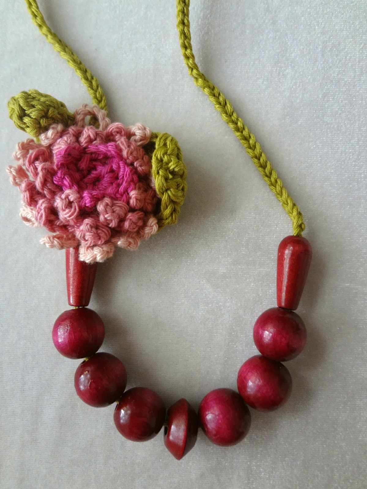 Little Treasures Crocheted flower and bead necklace magenta
