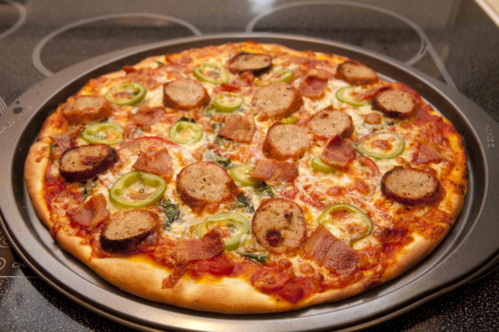 Cooking to a Soundtrack Bacon Sausage Pizza and Underdogs