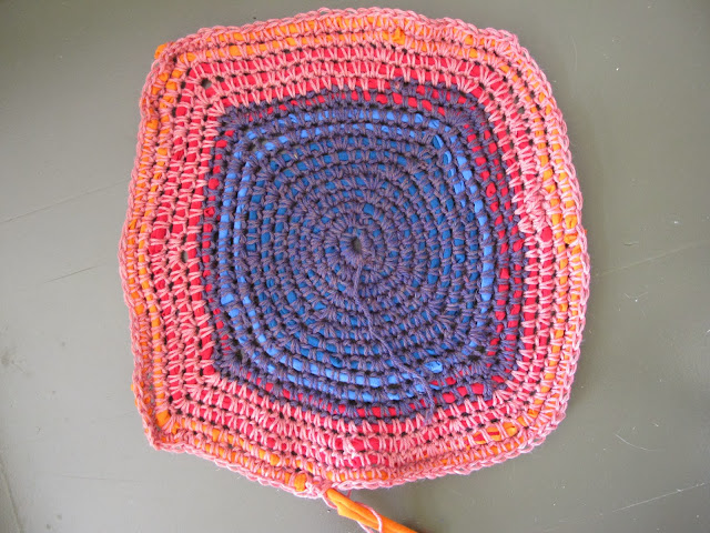 Wrapping a single crochet stitch around T-Shirt Yarn creates a softer fabric. 