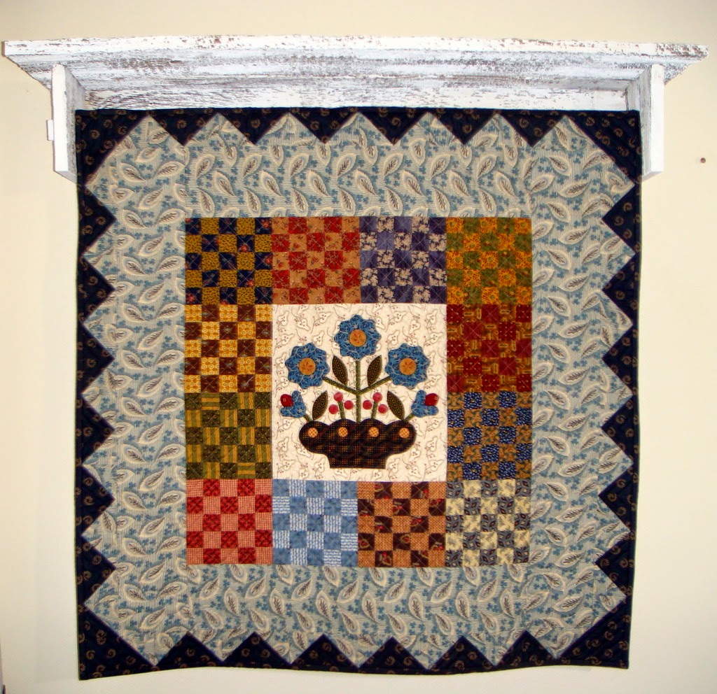 Quilt shelf and Jo Morton quilt