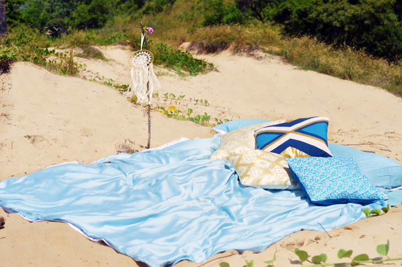 ettitude organic baby blue lyocell bamboo sheets used in boho beach set up on tropical beach ettitude organic baby blue lyocell bamboo sheets used in boho beach set up on tropical beach
