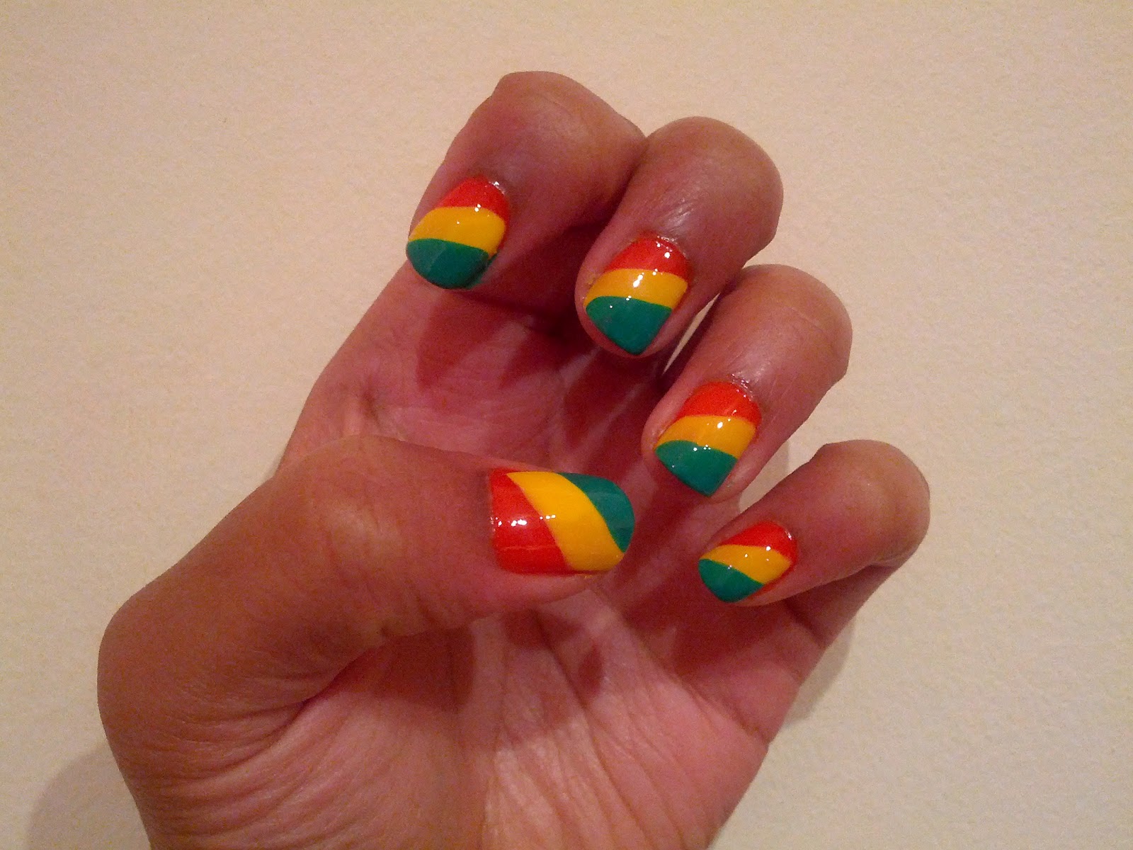 2. Reggae-themed toe nail art - wide 7