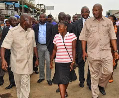 PHOTO OFTHE DAY: Governor Oshiomole & 'Go & Die' Widow Inspecting Projects