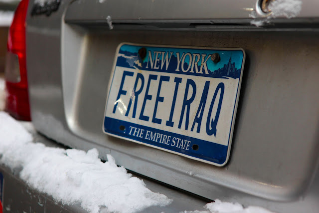 A personalized New York license plate that says, "Free Iraq".
