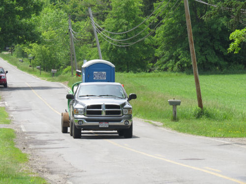 porta potty on truck
